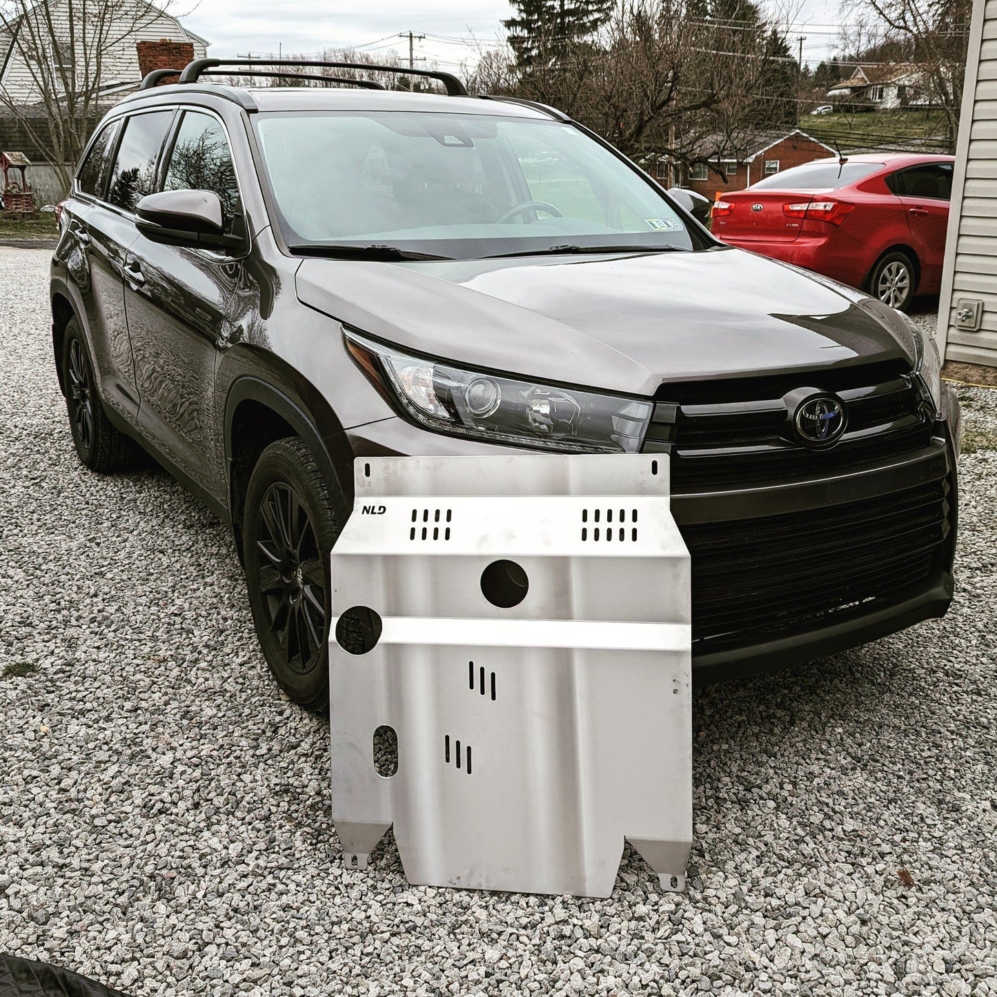 Skid Plate with Oil Drain Hole added in