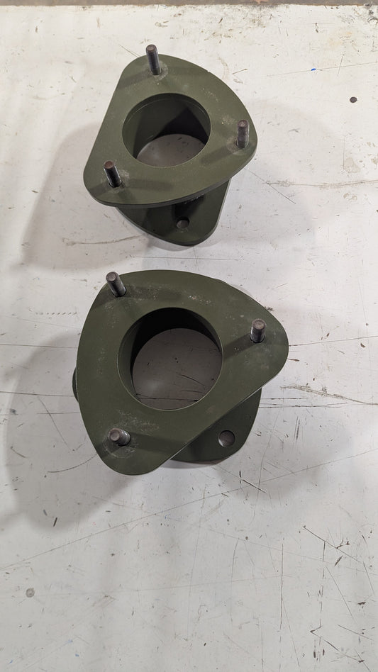 Front strut spacers