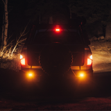 heretics flush mount amber ba-2 mounted on the bumper of a truck 