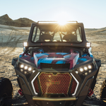 pair pack of quattro led lights mounted on a polaris as a ditch light